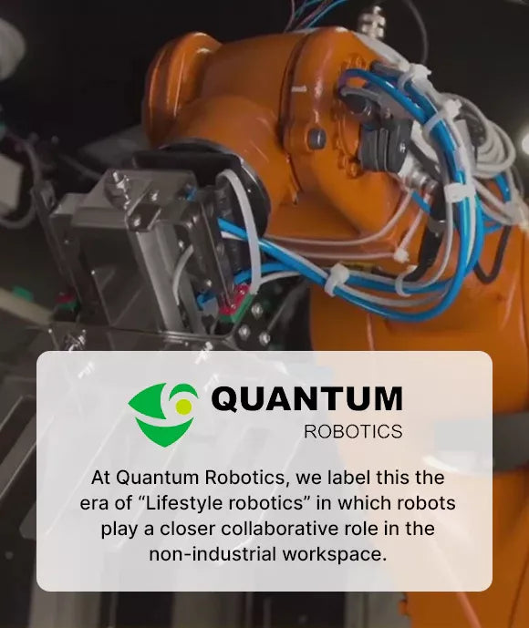 Quantum Robotics about section featuring an industrial robotic arm and a brand statement introducing their concept of ‘lifestyle robotics’ for collaborative, non-industrial workspace automation.