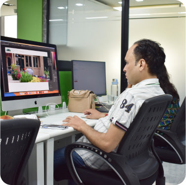 UI Designer at CF Funnels reviewing funnel layouts and project screens during a work session.